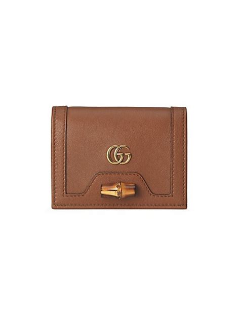 gucci card case saks.